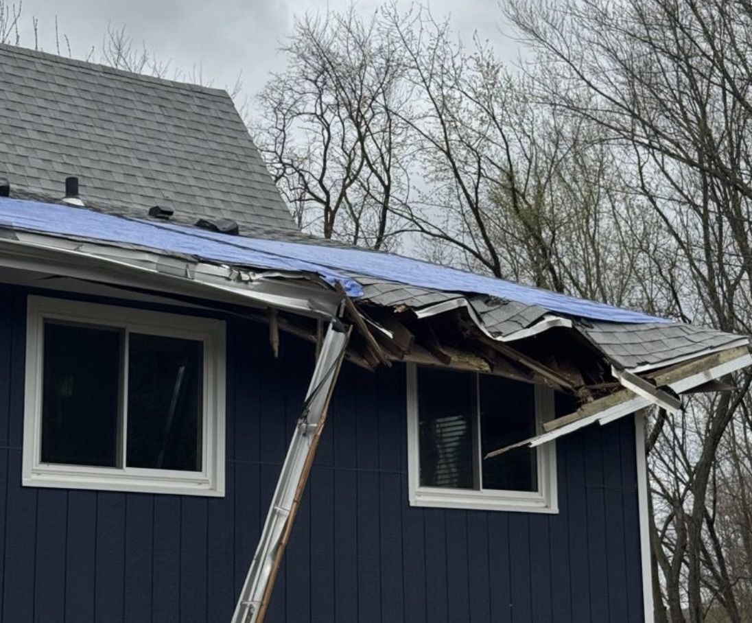 roof affected by severe storm damage
