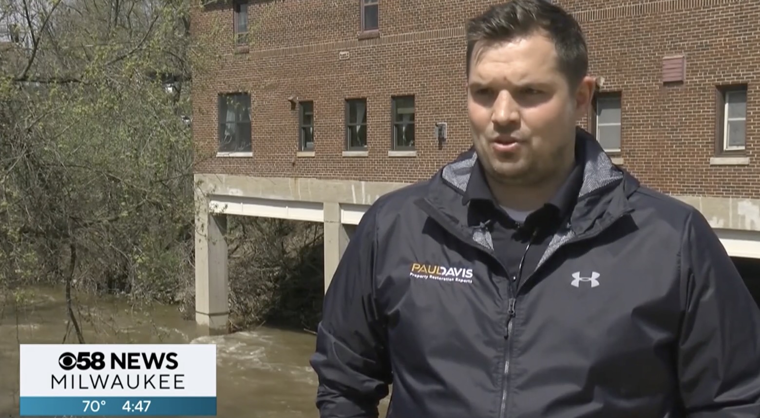Jon Wuest on CBS 58 talking about storm damage and flooding